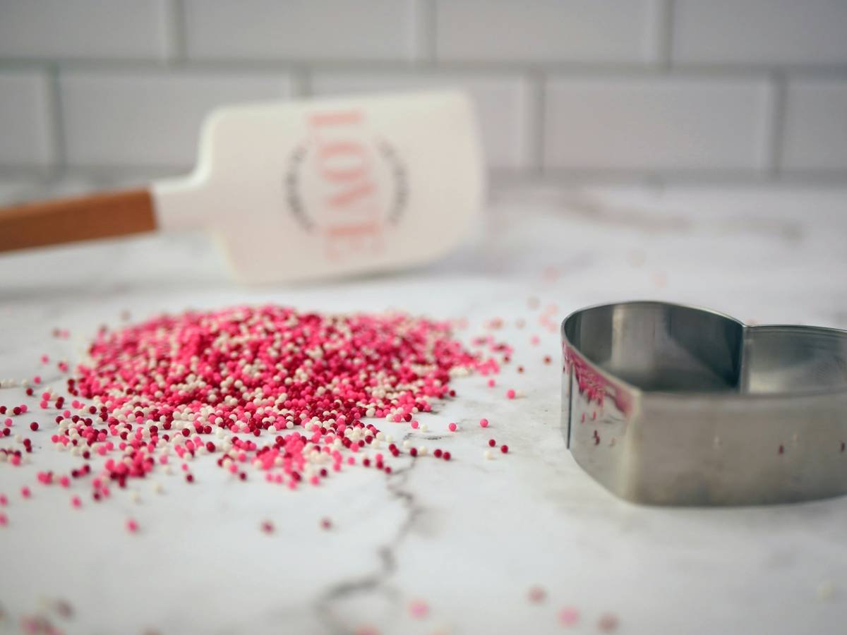 Step-by-step photo showing how to make candy decorations using a thermometer and silicone mold