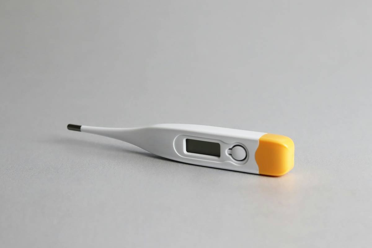 close-up of food network candy thermometer displaying precise sugar stage temperature